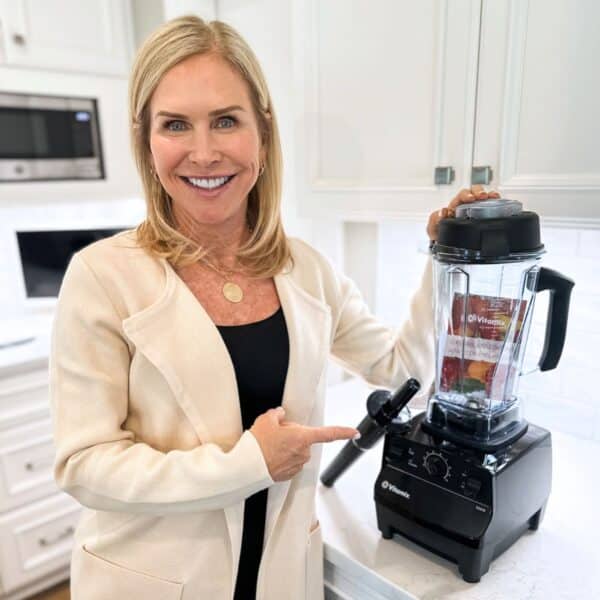 best kitchen gadgets from amazon influencer holding vitamix blender