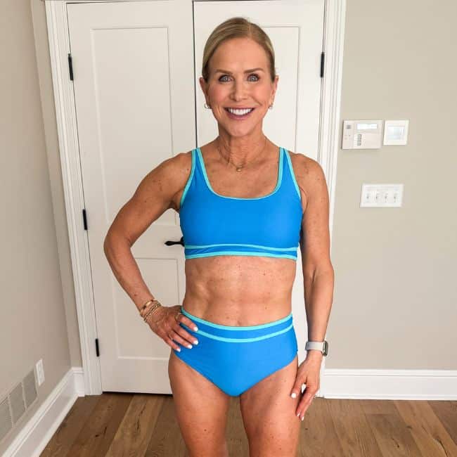 woman wearing blue sporty two piece bathing suit