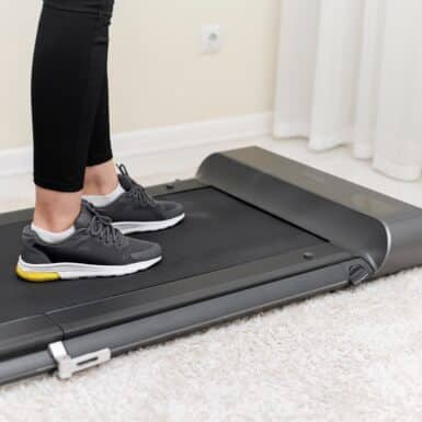 woman walking on walking pad for weight loss 2024