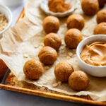 pumpkin protein balls on baking sheet