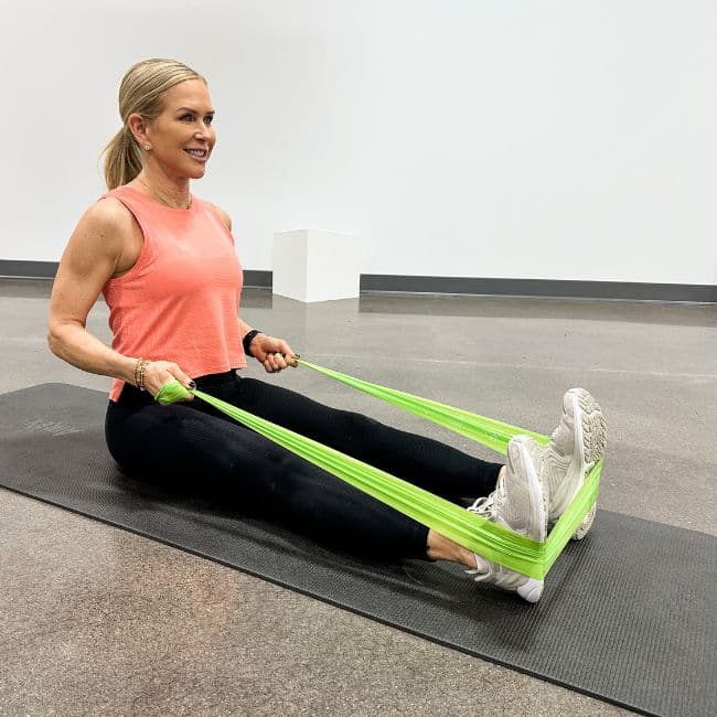 woman using resistance band for physical therapy