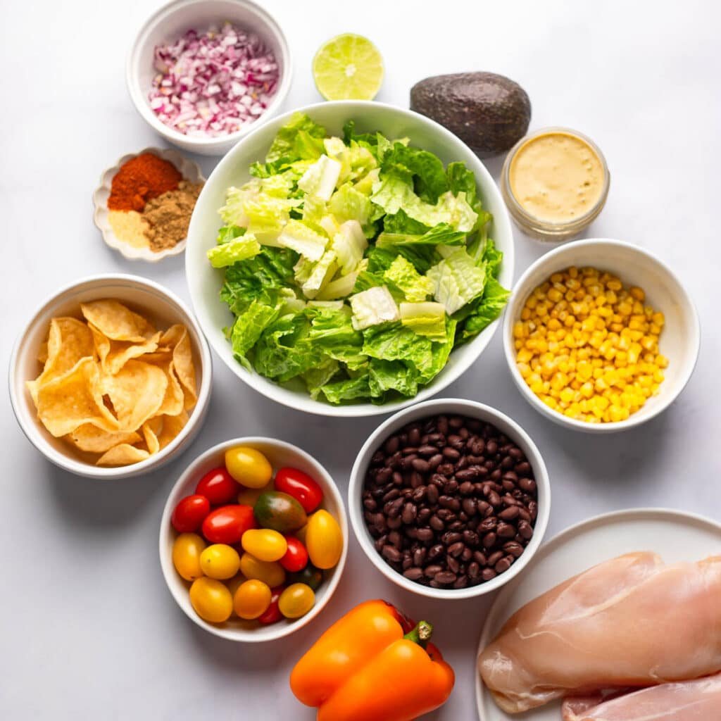 ingredients for southwest chicken salad recipe on white countertop