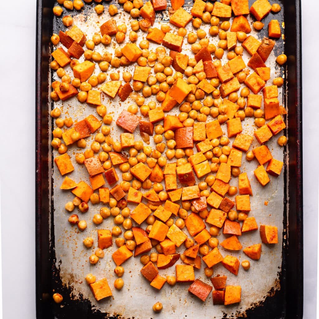 Chickpeas and sweet potatoes roast on the leaf frying pan for the prescription of chickpeas