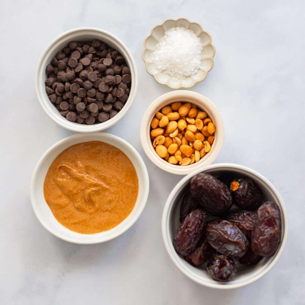 raw ingredients for healthy snickers date dessert on counter