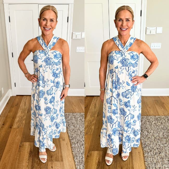 mature woman wearing criss cross maxi dress in white and blue floral pattern