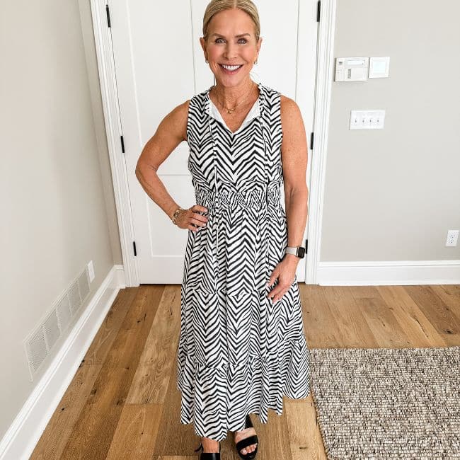 woman over 50 wearing zebra maxi dress