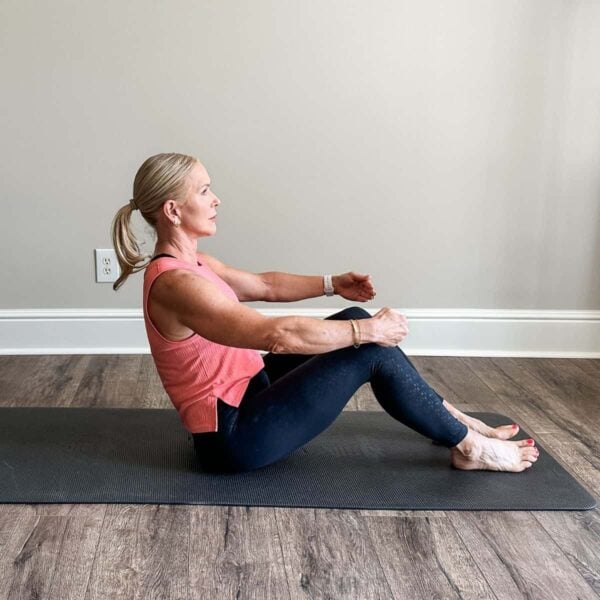 Certified trainer demonstrating at-home Pilates exercises for core strength