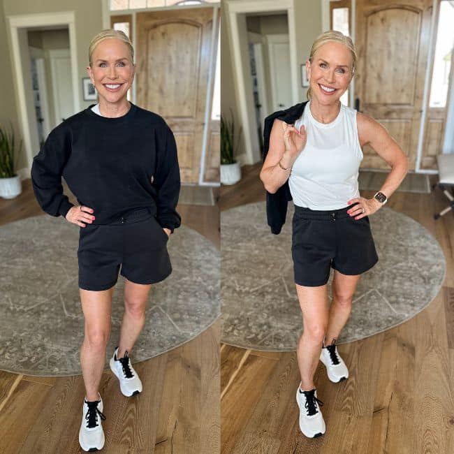 A smiling woman stands indoors in two side-by-side photos. On the left, she wears a black sweatshirt and black shorts; on the right, she wears a white sleeveless top, holding the sweatshirt, with the same shorts and sneakers in both photos.