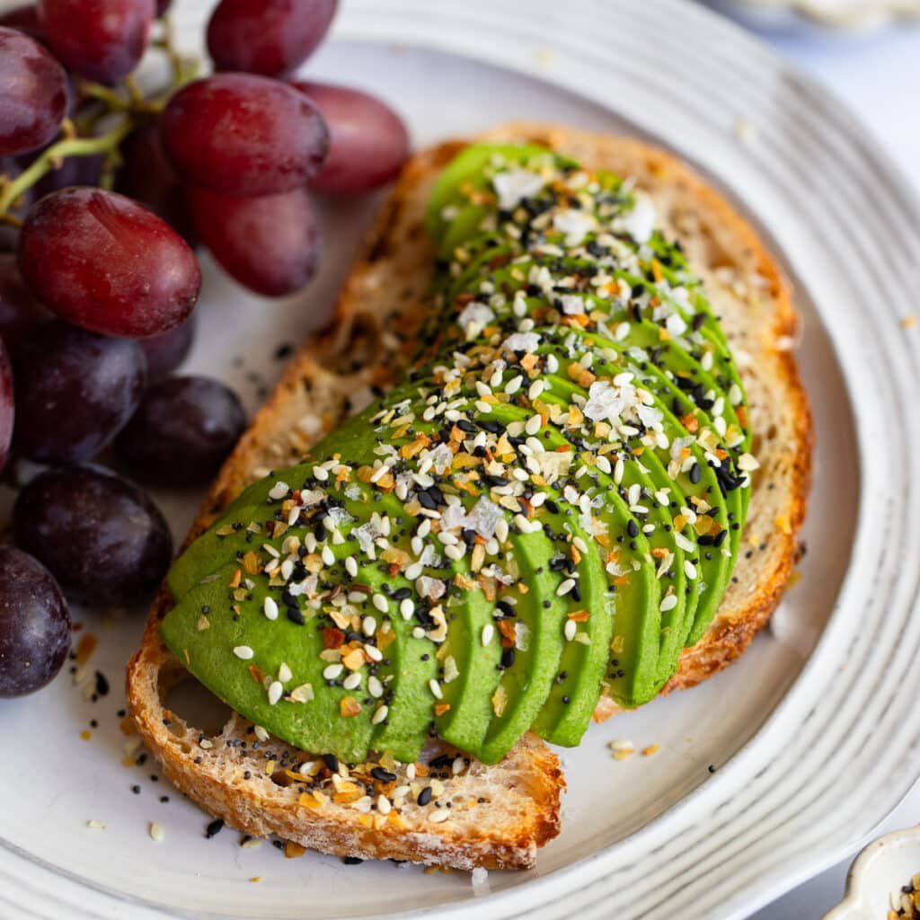 close up image of avocado toast with everything bagel seasoning