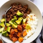 tiktoks viral beef bowl with cottage cheese and honey in bowl