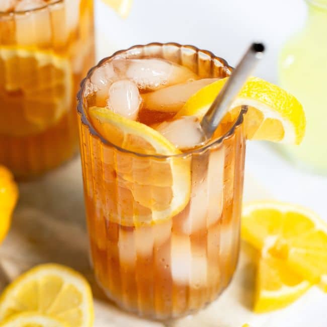 Arnold Palmer mocktail served in glass cup with garnish