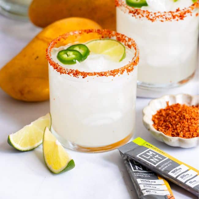 Skinny Mango Chili Spicy Margarita mocktail close up view of drink with garnish