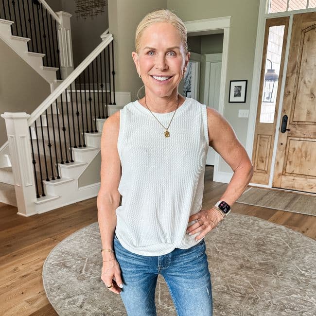 woman wearing sleeveless knit top for women over 50 to hide tummy from amazon
