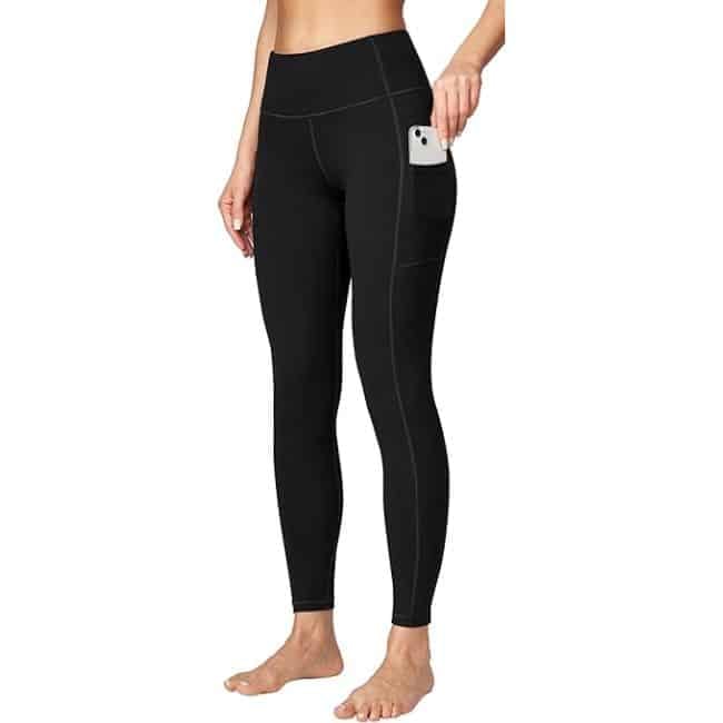 Woman wearing Ewedoos high-waisted compression Amazon leggings for workouts and support
