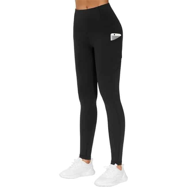 Woman wearing thick high-waisted Amazon workout leggings with pockets for strength training