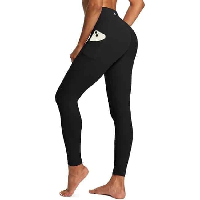 Woman wearing IUGA high-waisted Amazon leggings with pockets for everyday wear and workouts