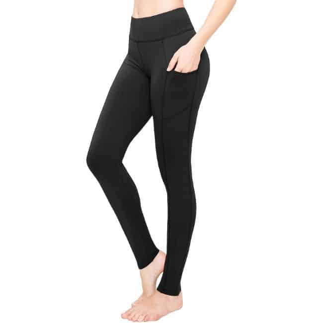 Woman wearing Satina high-waisted Amazon leggings for lounging and everyday comfort