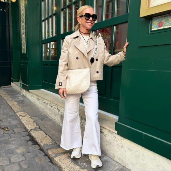 Woman walking confidently in supportive sneakers during a long-distance walk, featuring comfortable travel shoes for women that help prevent foot pain
