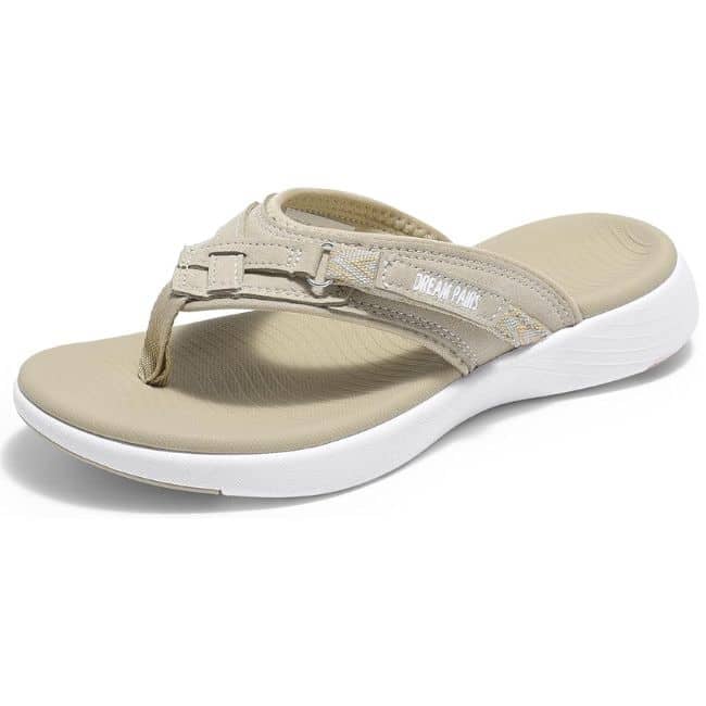 Casual slide sandal for women over 50 styled with linen pants and relaxed summer outfit