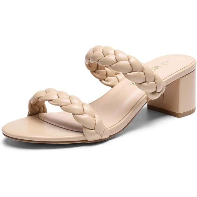 Elevated comfort sandal styled for women over 50 with white jeans and summer outfit