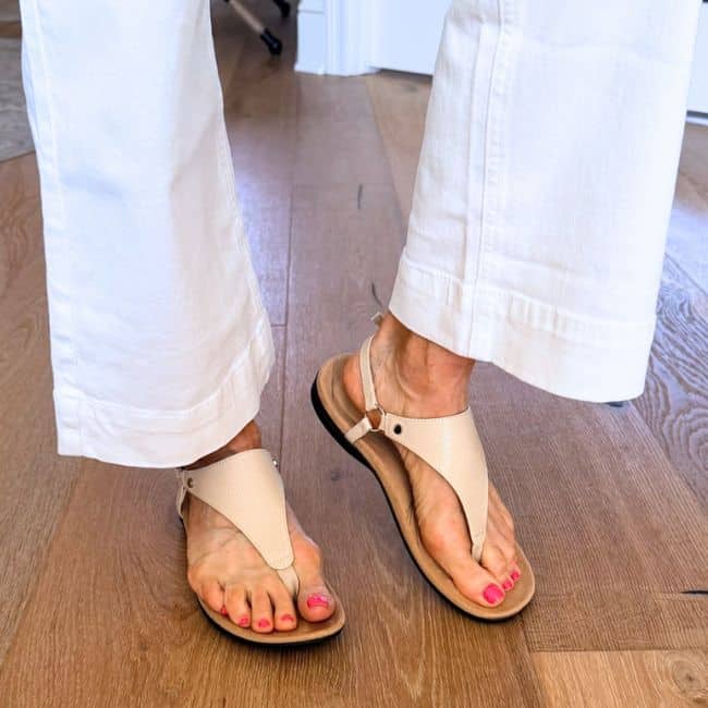 Neutral comfortable sandal styled with summer dress for women over 50