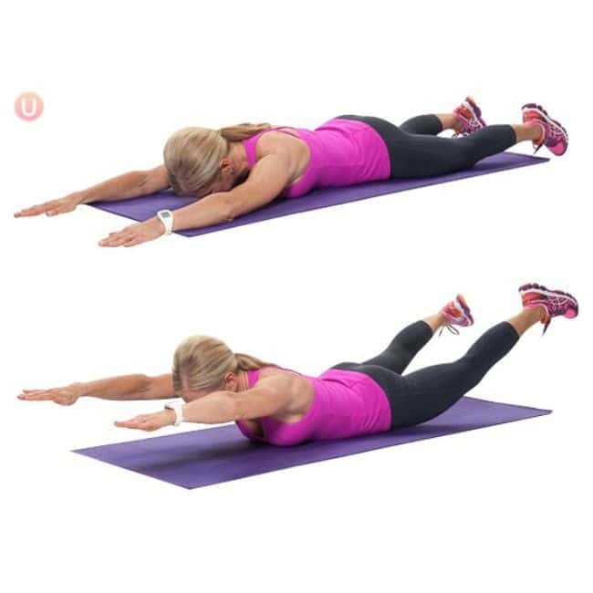 Woman lying face down performing superman exercise to strengthen lower back and core